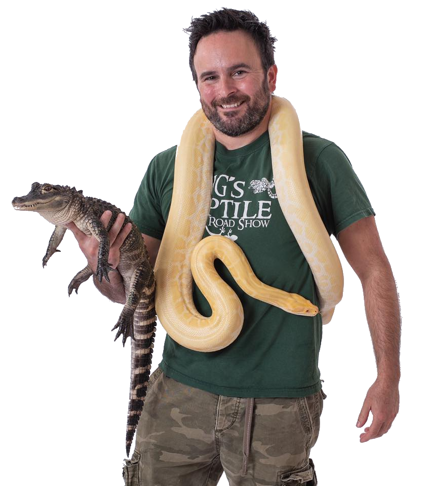 Jim Galeno holding a large reptile at one of his shows