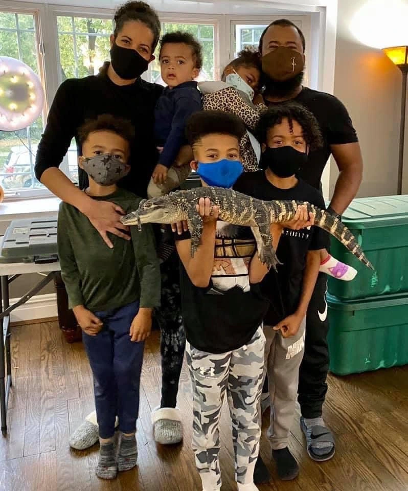 Jim introducing the American alligator to a group of fascinated kids