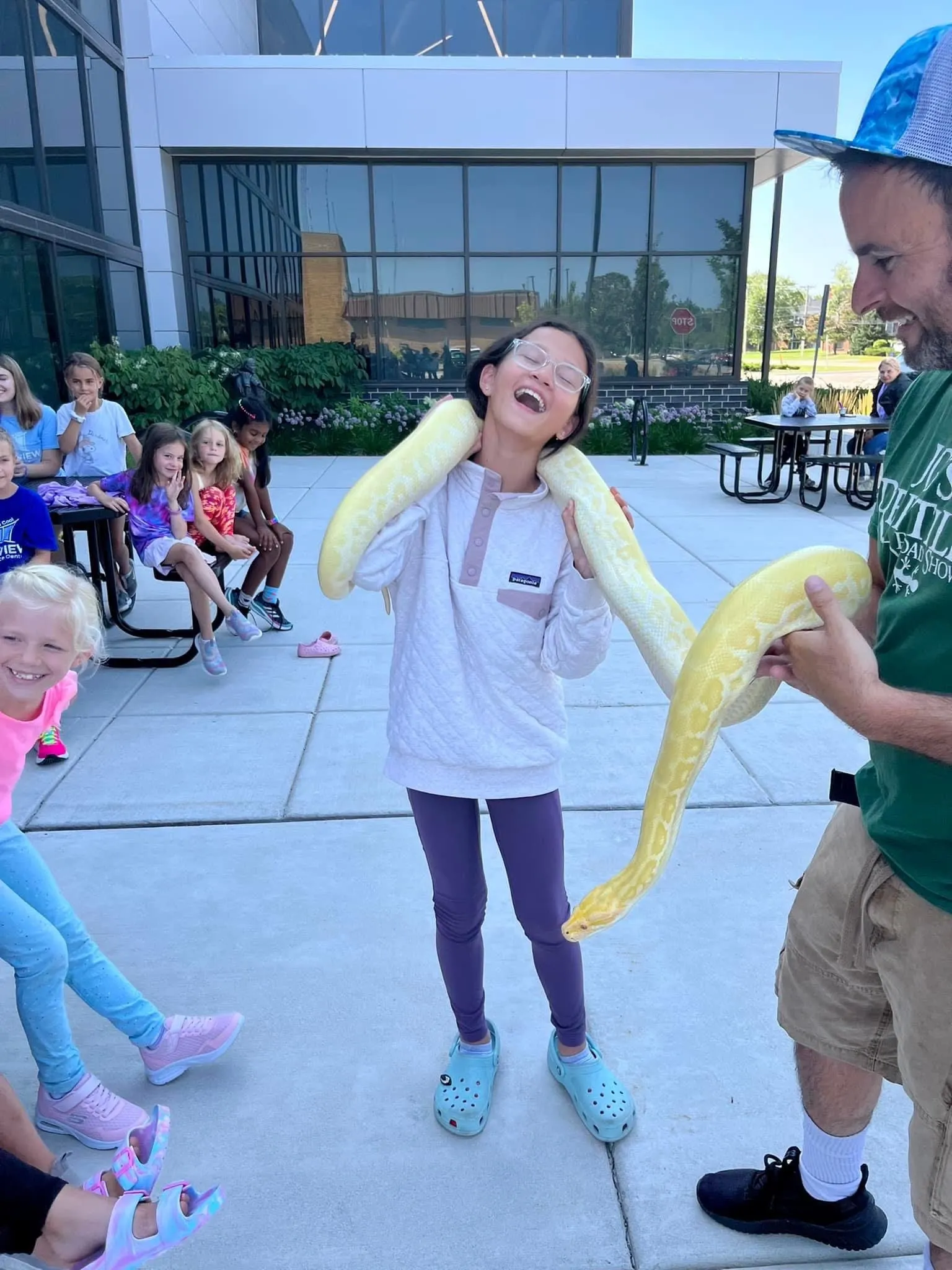 Kids gathered for the final group photo at a reptile birthday party